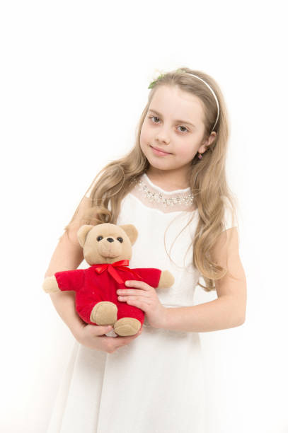 istock Girl smile with soft toy gift 1220085099
