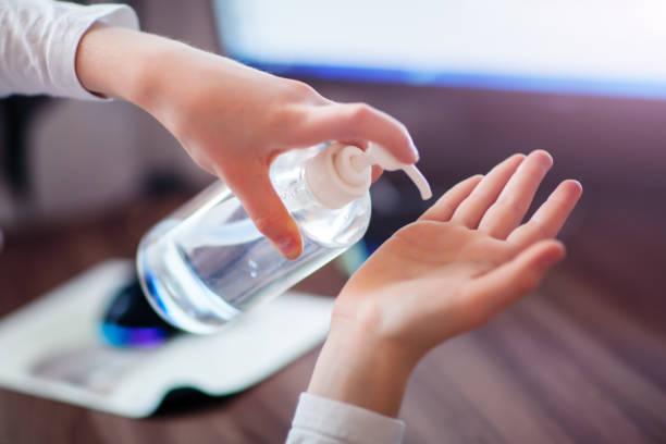 the child disinfects their hands with a disinfectant. new epidemic coronavirus 2019 ncov. selective focus. - blood sample imagens e fotografias de stock