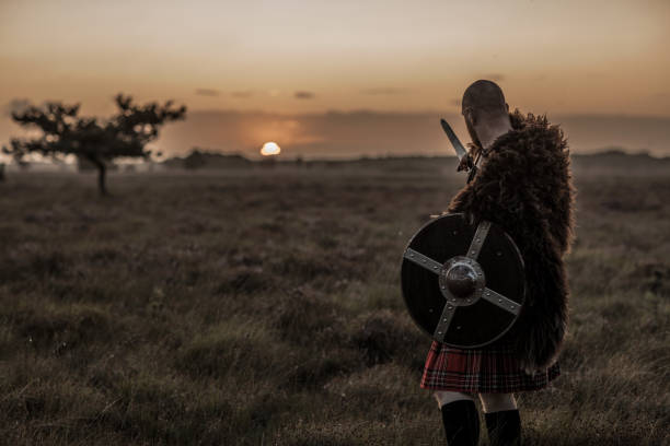 istock Scottish Redhead Warrior wearing a kilt 1220088553