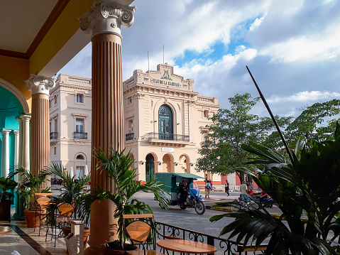 Santa Clara, Villa Clara, Cuba-January 21, 2020: The Charity Theater, a Cuban National Monument, seen from the porch of a colonial building in the city center