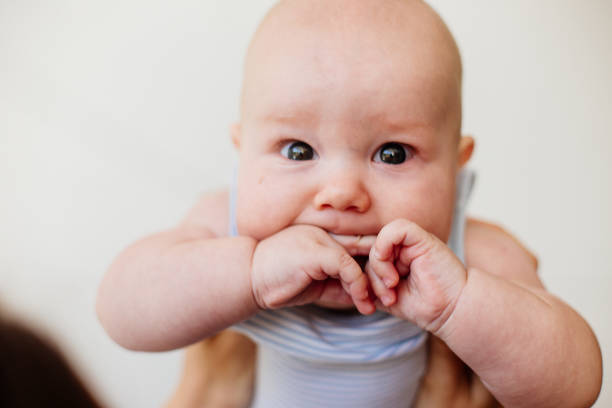 istock A little baby and his mom. 1220095921