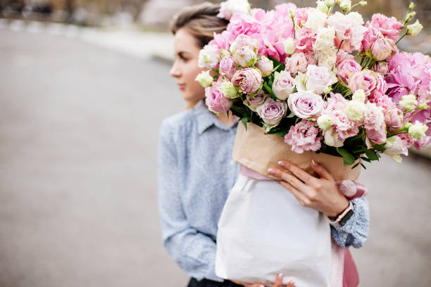 istock Bouquet of flowers in bag. 1220095959