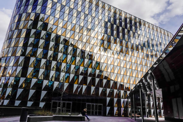 Stockholm, Sweden April 21, 2020 The grounds of the new Karolinska Hospital and the faceted modern Aula Medica building.
