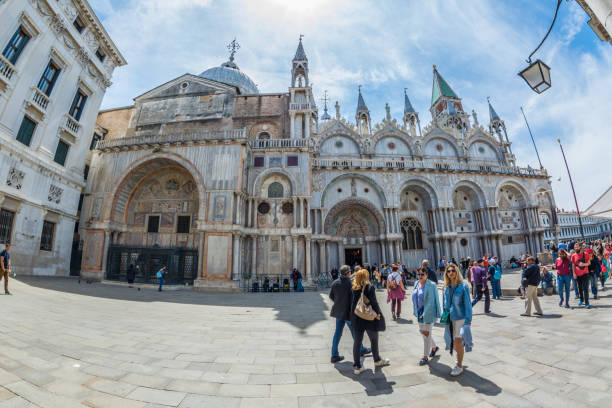 the patriarchal cathedral basilica of saint mark at the piazza san marco - st mark's square , venice italy. - patriarchal cross imagens e fotografias de stock