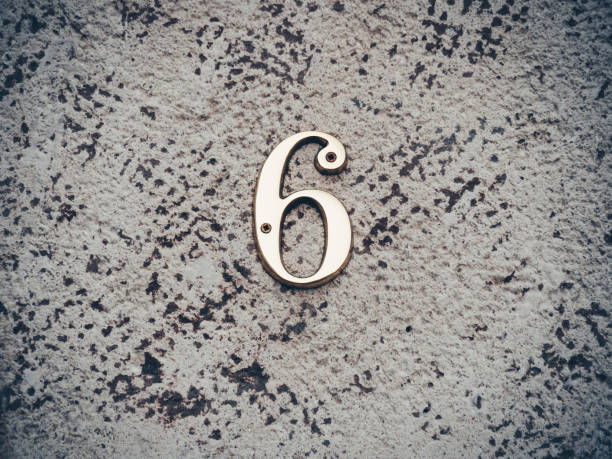 istock The six house number placed on the brick wall. 1220099528