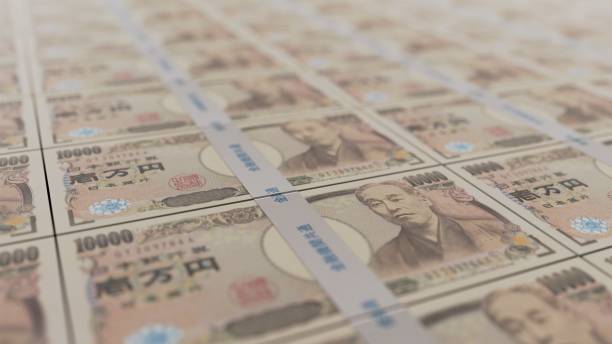 аккуратно выровнены японские пачку 10000 иен законопроектов - символ иены стоковые фото и изображения