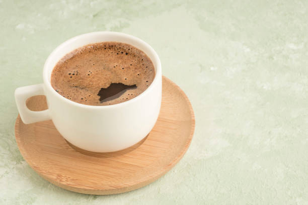 istock cup of Turkish coffee on a green with copy space 1220102071