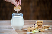 home baked cranberry cookies and glass of milk