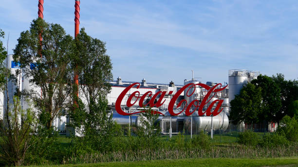Coca Cola bottling company in Hungary Huge Coca Cola logo shows the bottling company's location in Dunaharaszti, Hungary coke zero photos stock pictures, royalty-free photos & images