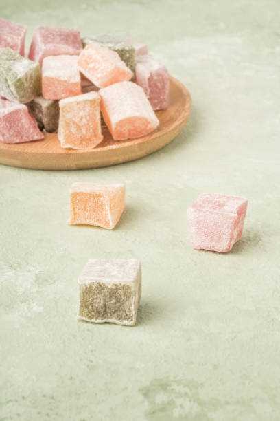 istock Turkish delights on a green background with copy space 1220104251