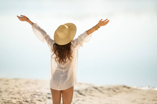 istock Woman Resting on the Beach During Vacation 1220106695