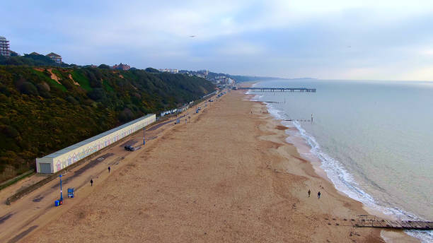istock Colorful beach houses in England - typical view 1220106828