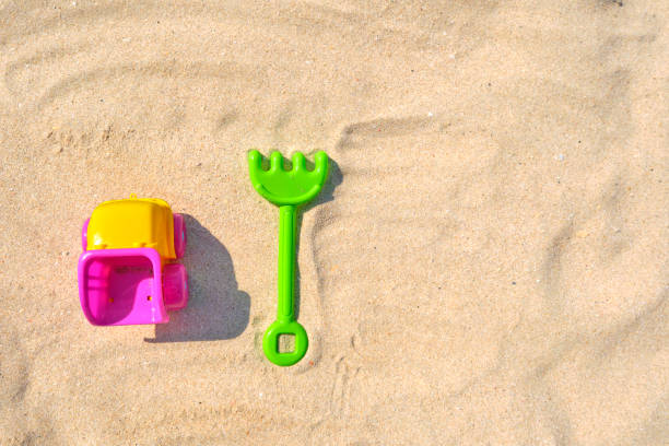 istock Colorful Beach Toys at a Beach on a Sunny Day 1220107857
