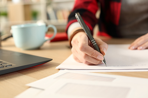 Student Girl Hands Writing Letter At Home Stock Photo - Download Image Now - Letter - Document, Handwriting, Writing - Activity - iStock