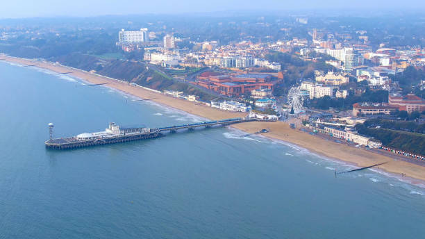Bournemouth beach and pier in England Bournemouth beach and pier in England -aerial photography boscombe photos stock pictures, royalty-free photos & images
