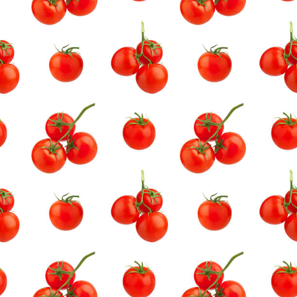 istock Seamless pattern of red tomatoes on white background isolated closeup, cut and whole cherry tomato repeating ornament, fresh vegetables art wallpaper, healthy natural food concept, trendy print design 1220109340