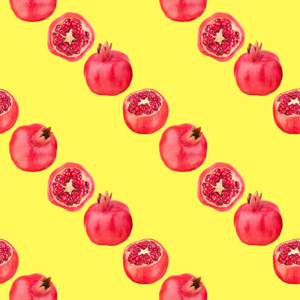 istock Seamless pattern of red pomegranates in rows on yellow background isolated, whole and cut pomegranate with seeds repeating striped ornament, fruit lines backdrop, stripes garnet fruits art wallpaper 1220109355