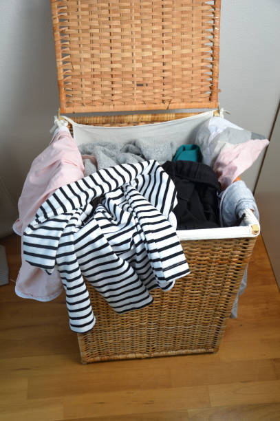 istock a laundry basket full of clothes 1220109846