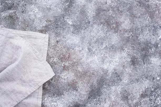 istock Linen napkin or towel on grey kitchen table 1220110037