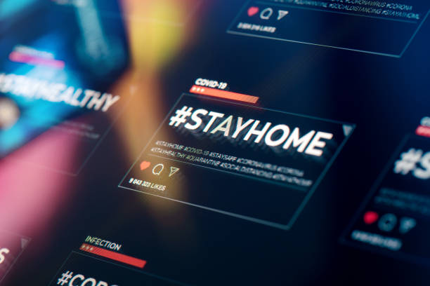 istock #stayhome. Stay home hashtag close-up on digital display 1220111037