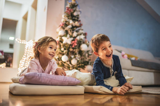 istock Happy children on Christmas Eve 1220114496