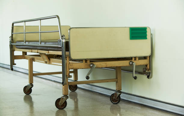 istock An old empty patient bed in hospital 1220115577