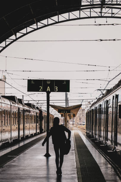 Northern Train Station Platform in Beautiful City of Arts Valencia, Spain a women walking away at hall train station platform for boarding an electric train before Departure.
Valencia, Spain - November 22, 2018 train station black and white stock pictures, royalty-free photos & images