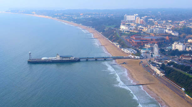 Bournemouth beach and pier in England Bournemouth beach and pier in England -aerial photography boscombe photos stock pictures, royalty-free photos & images