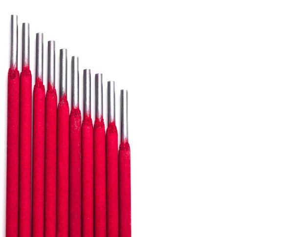 Red Welding electrodes, welding equipment, electrodes, isolated on white background, consumables for welding