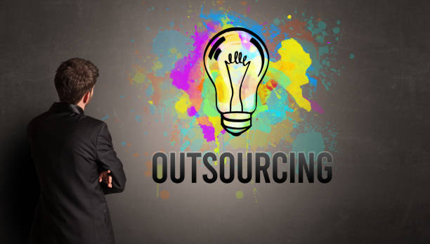 istock businessman drawing colorful light bulb 1220122921