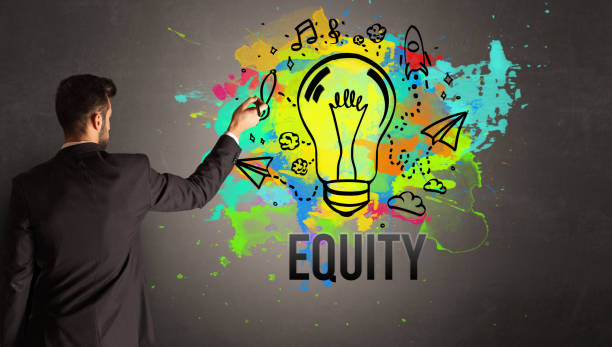 istock businessman drawing colorful light bulb 1220123043