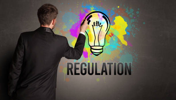 istock businessman drawing colorful light bulb 1220123390