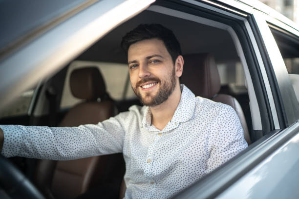 istock Portrait of driver smiling 1220123745