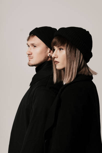 istock Millennial fashion couple on a white background in studio 1220125132