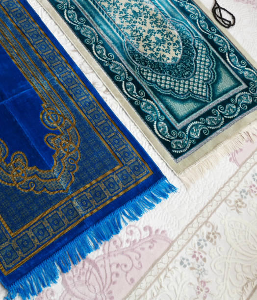 istock Prayer rugs on a carpet in a house, 1220126662
