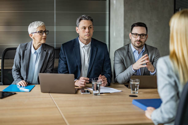 istock Human resource team talking to their candidate on a job interview. 1220127166