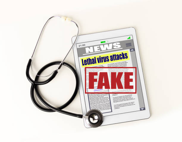 istock stethoscope lying on top with a news in the tablet 1220127370