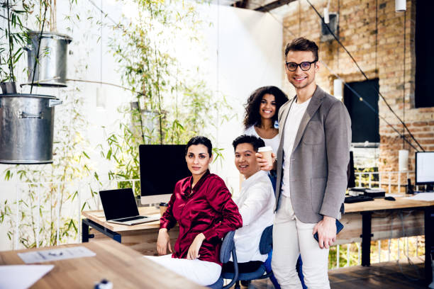 istock Multiracial business people spending time in modern office 1220128431