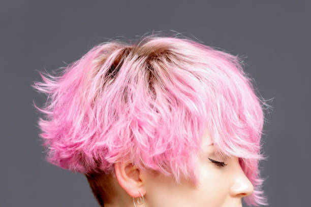 istock Woman with pink hairstyle. 1220129035
