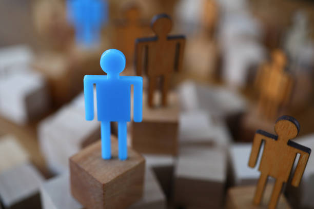 istock Miniature people made of wood 1220130348