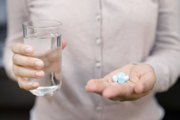 istock Medicine pills in hand 1220130916