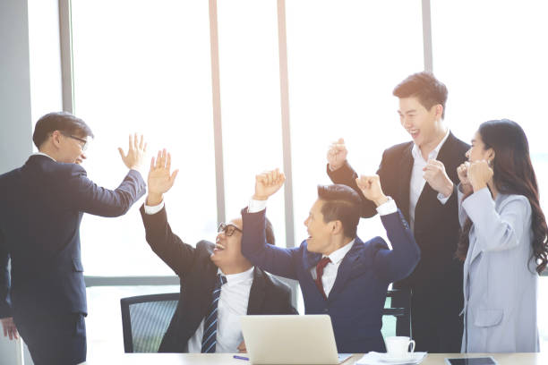 istock Business congratulate sales growth from abroad 1220131345