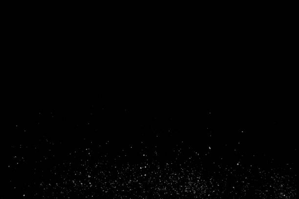 istock Isolated Dust Dirt Particles Salt Snow Powder Spray. Authentic Black Rough Grunge Distressed Overlay Texture Surface. 1220134972