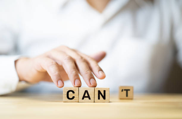 istock Self development concepts with text can or can't and business person.Positive thinking.confidence of human 1220138865