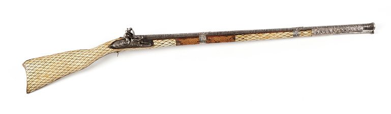 Antique ottoman rifle from 19th century on white background