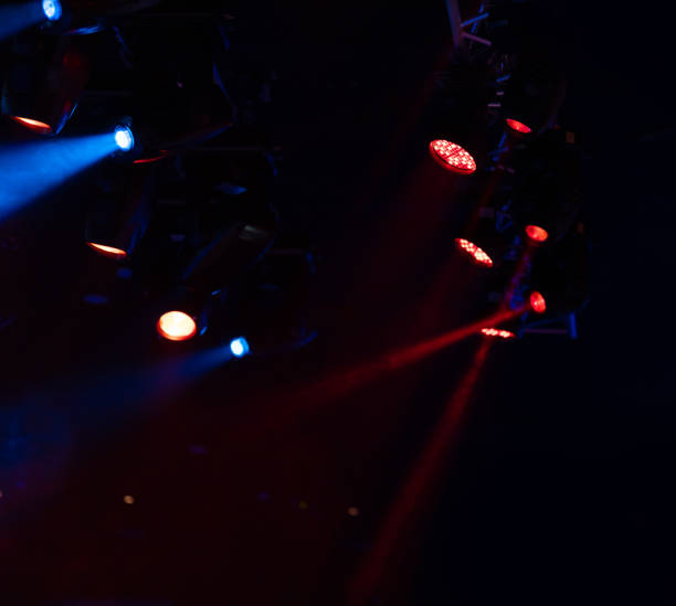 istock lights spotlights and smoke over the stage 1220144164