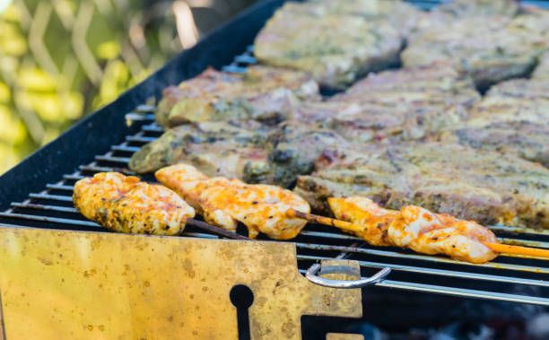 istock Grill with Meat in Garden 1220144443