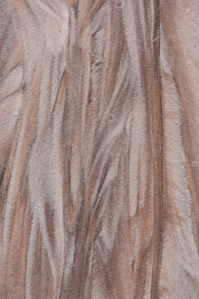istock Beige, brown and white hues in eroded sand 1220147949