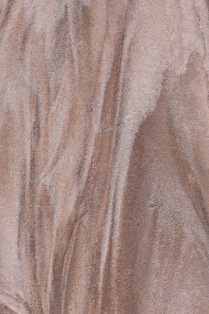 White, beige and brown hues in eroded sand