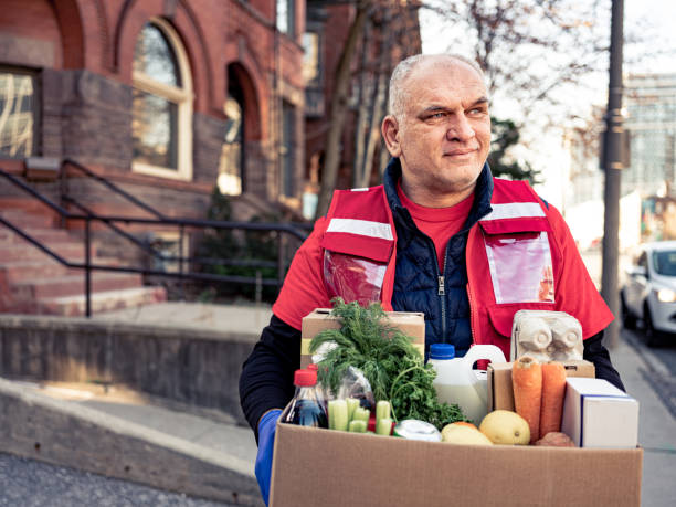 istock COVID-19, Donation Home food delivery during lockdown 1220150717